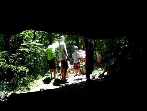 Boys prepare to enter the Mud Cave