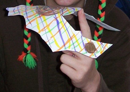 A finished bat-shaped center of gravity wing