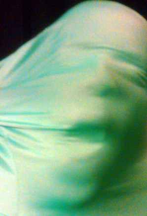 A distorted face through zentai material